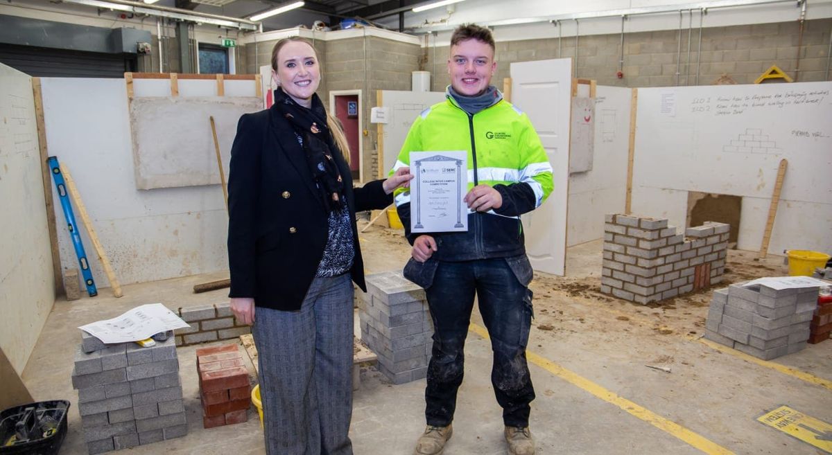 1st place Level 2 Bricklaying Apprentice Adam Fitzsimons from Downpatrick, employed by Michael Polly Contracts with Rachel McKeeman, Director of Industry Training & Support at Construction Industry Training Board NI (CITB NI).